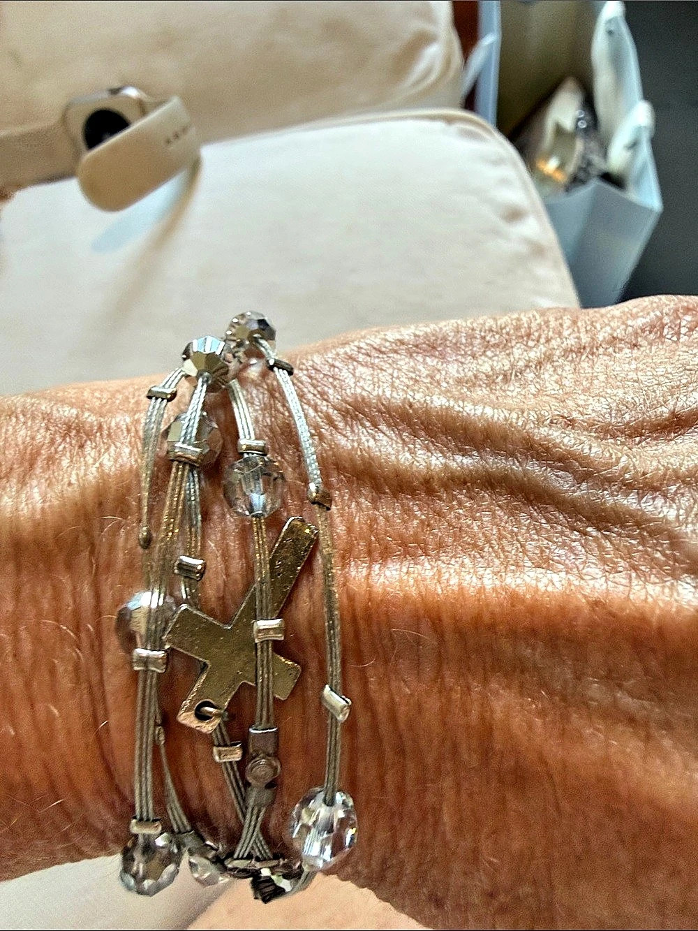 Multi-Strand Cross Charm Bracelet Stack